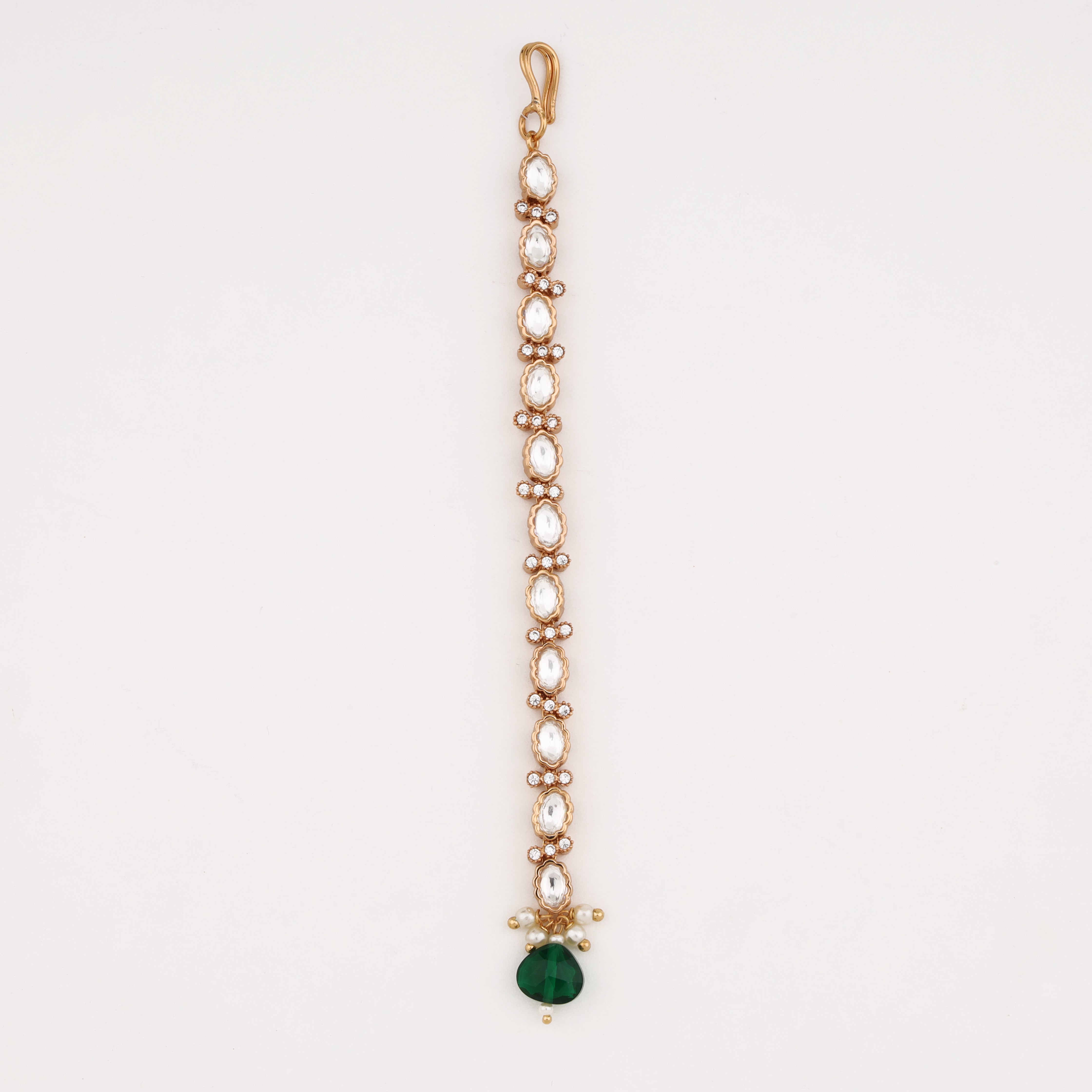 Diamond Emerald Drop Maang Tika featuring white kundan stones, emerald green teardrop charm, pearl accents, and rose gold finish by US Catalog