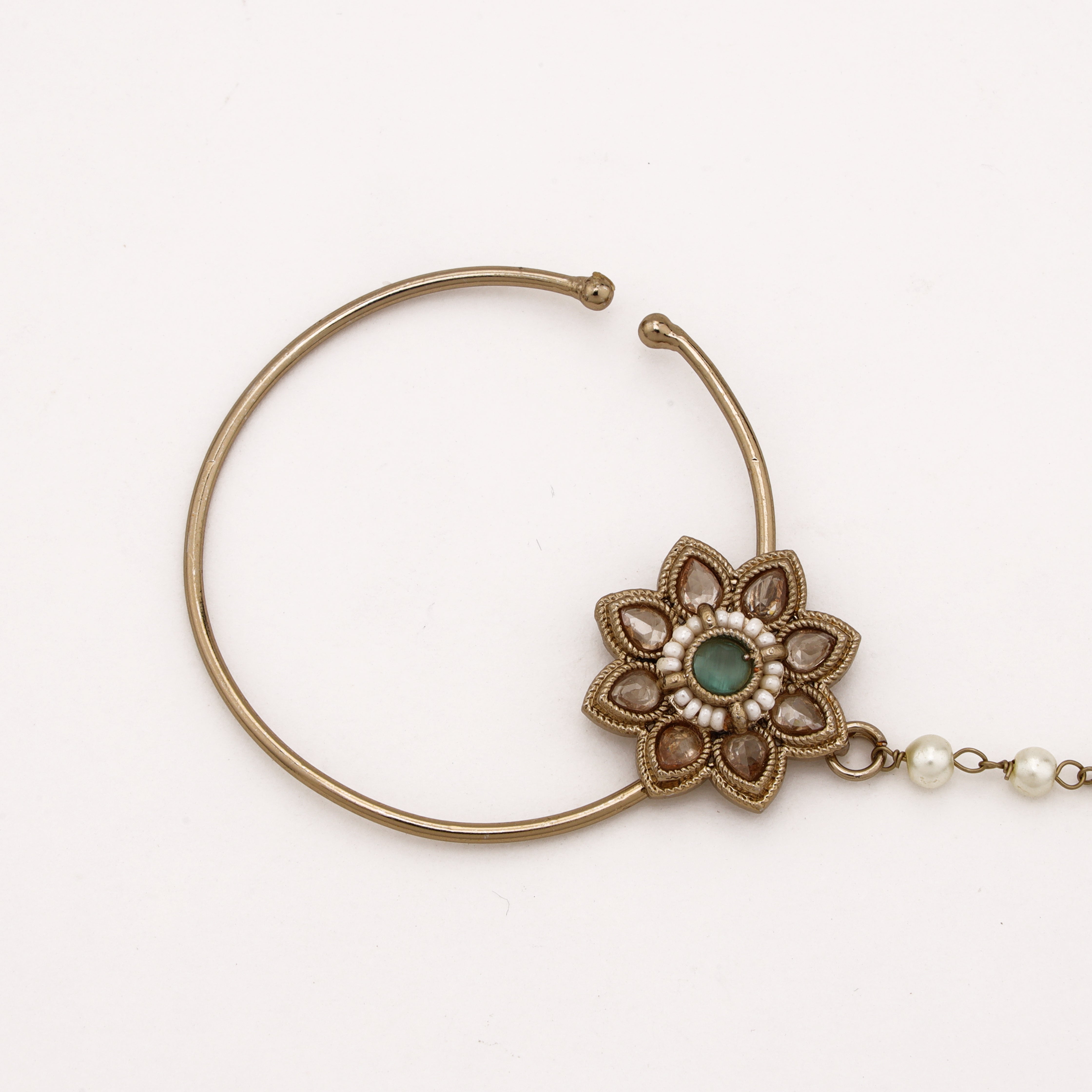 Antique gold Nayeli emerald lotus polki nath with green centre stone, teardrop accents and pearl-beaded chain from US Catalog