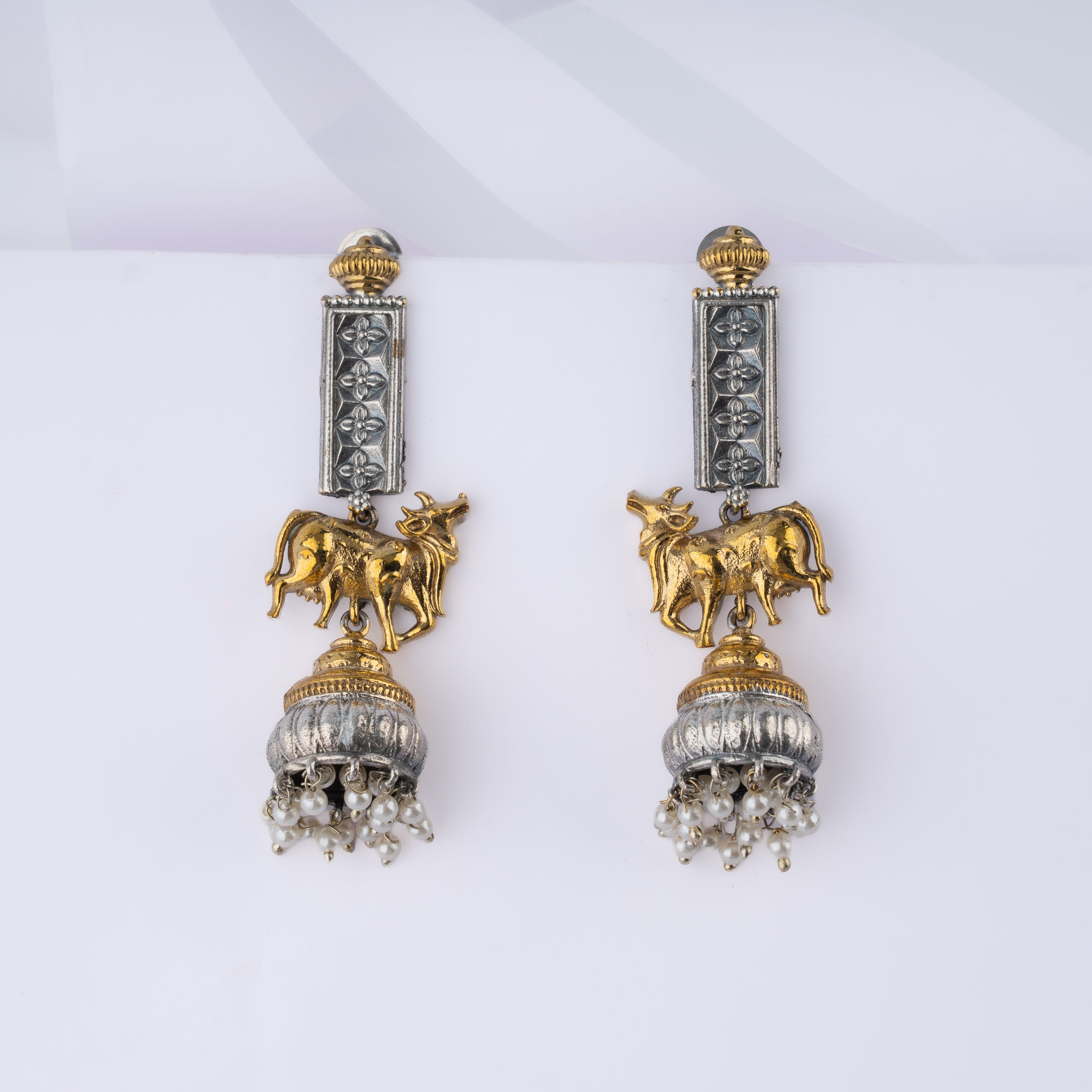 Dual Tone Sacred Cow Kamadhenu Column Pearl Jhumka Statement Earrings