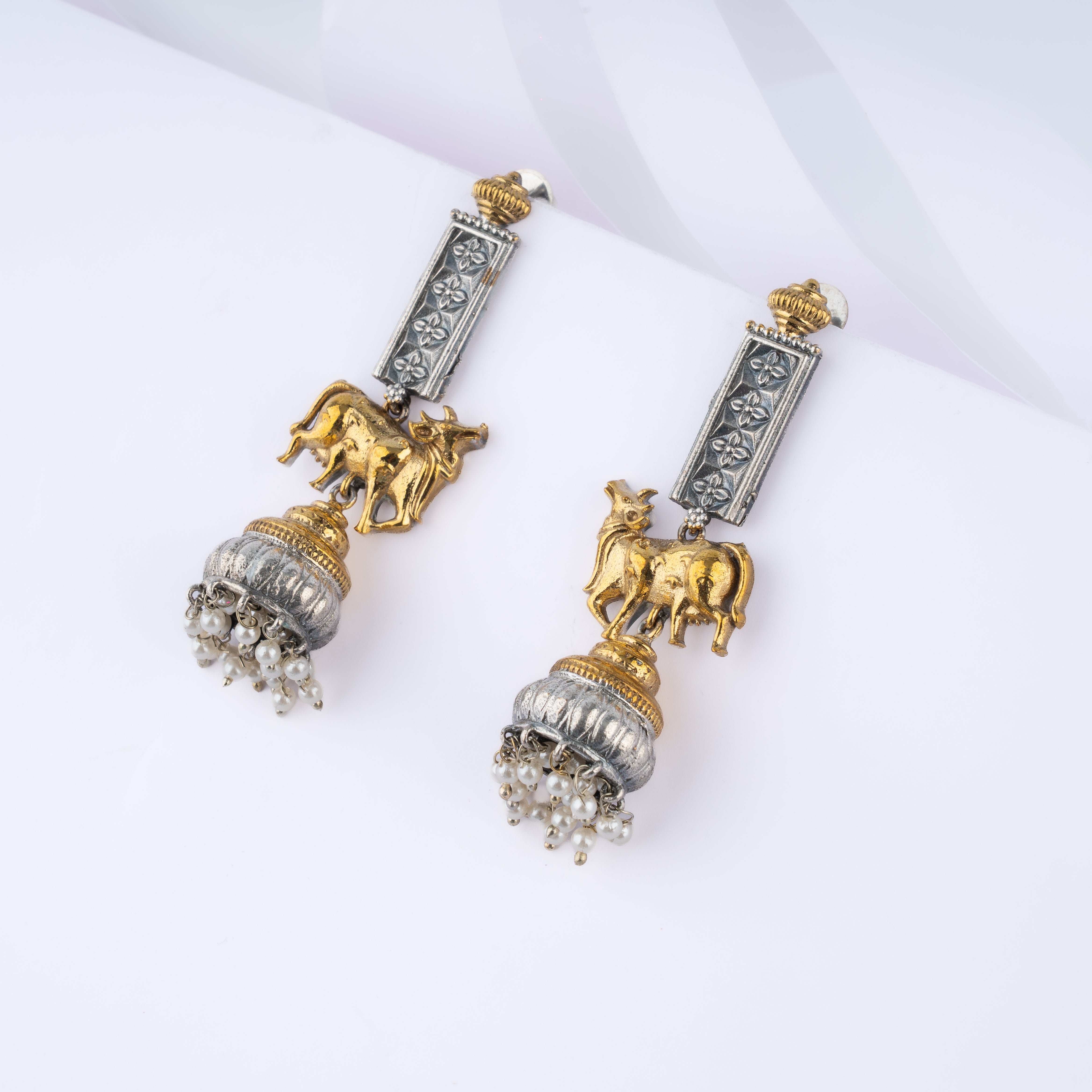 Dual Tone Sacred Cow Kamadhenu Column Pearl Jhumka Statement Earrings