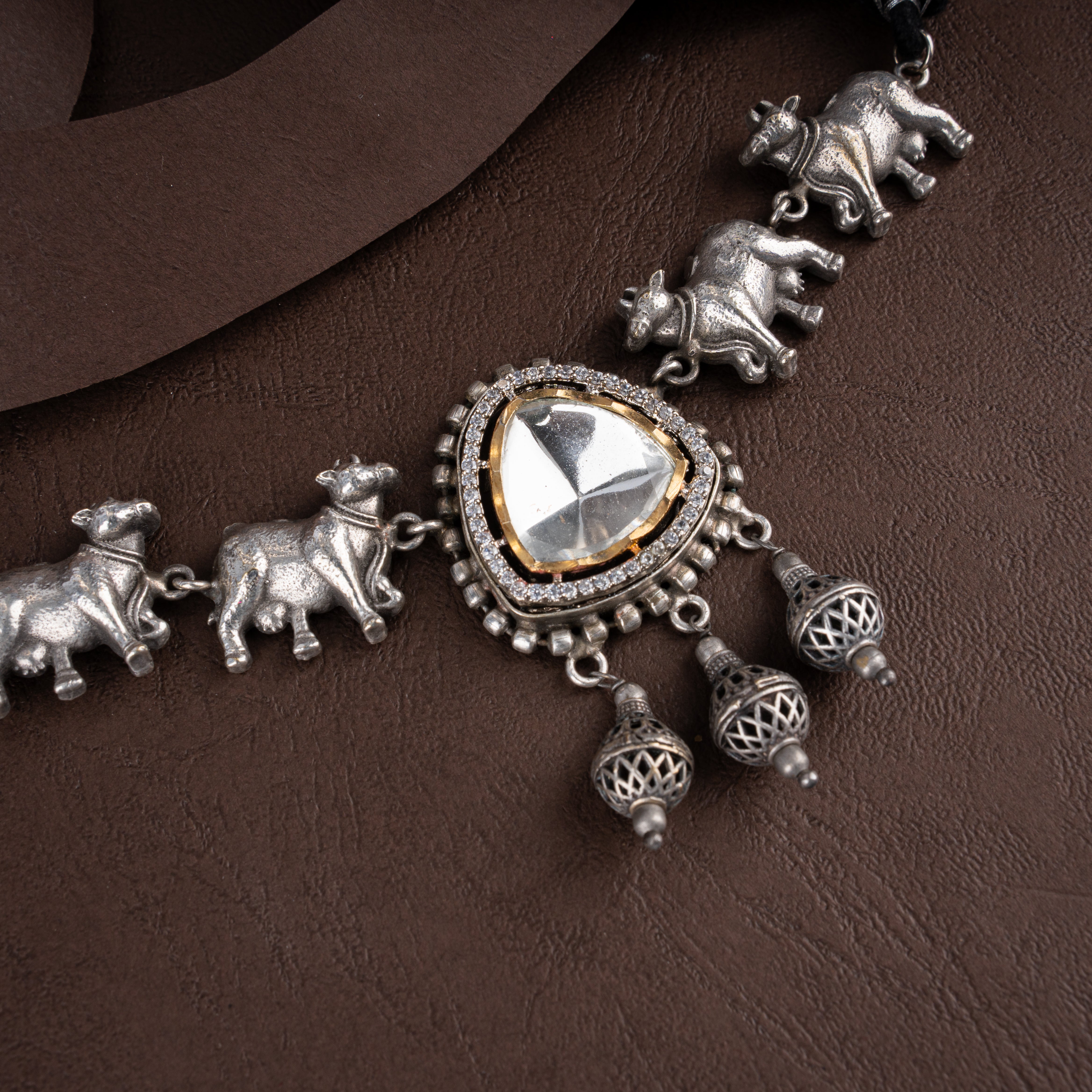 Oxidised Sacred Nandi Cow Motif Choker Necklace Set with Kundan Medallion and Drop Earrings
