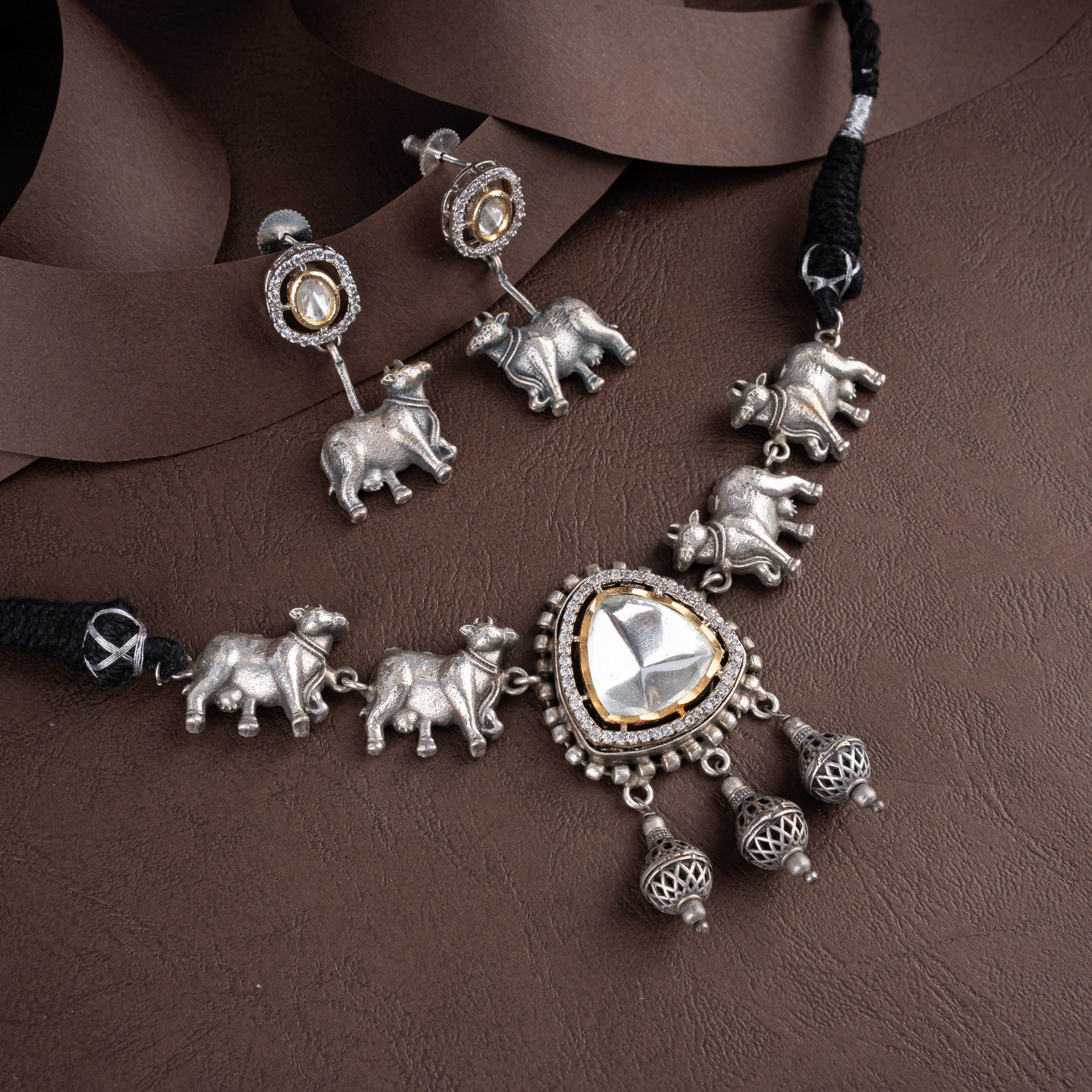 Oxidised Sacred Nandi Cow Motif Choker Necklace Set with Kundan Medallion and Drop Earrings