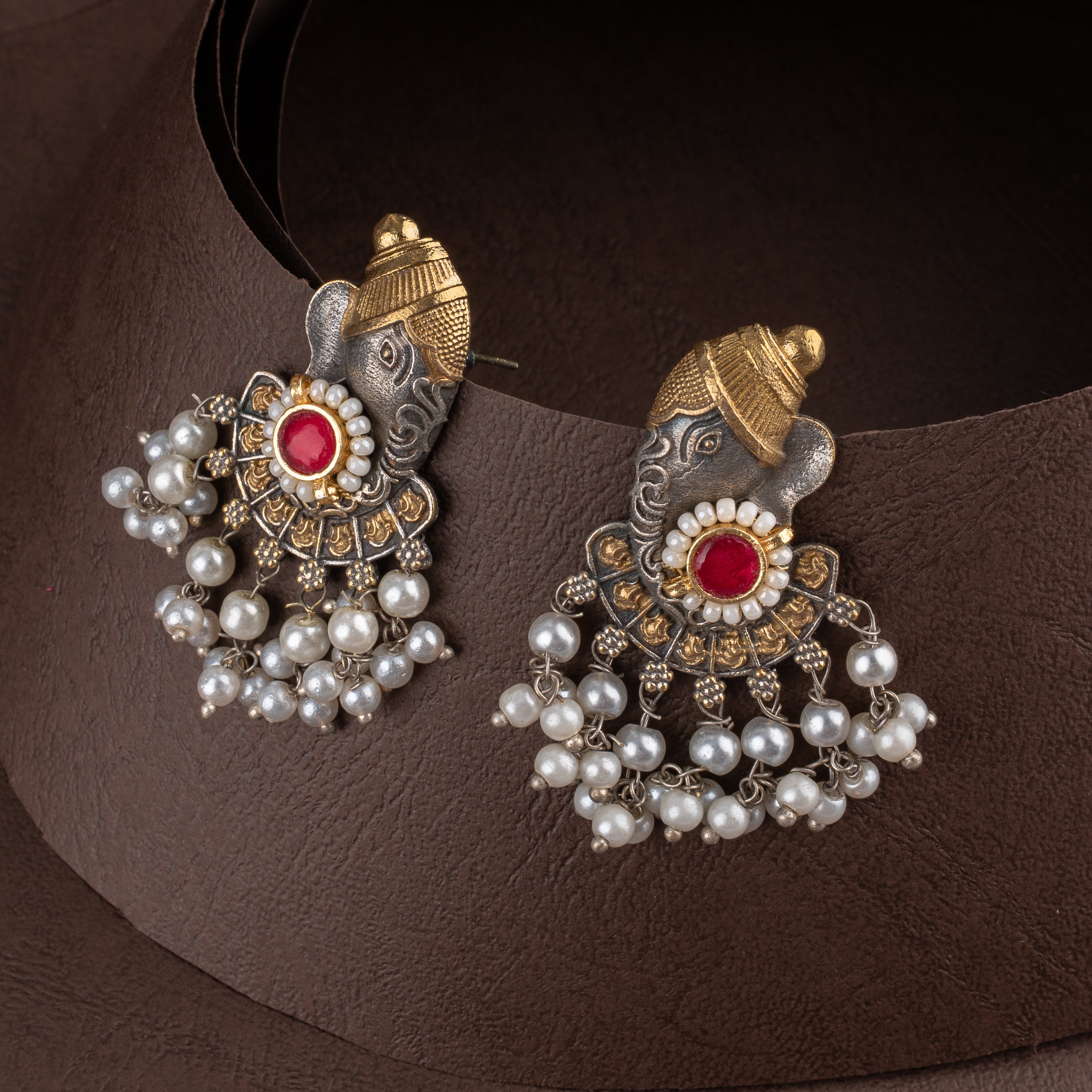 Dual-Tone Lord Ganesha Pendant Necklace Set with Kundan Stones and Pearl Drops