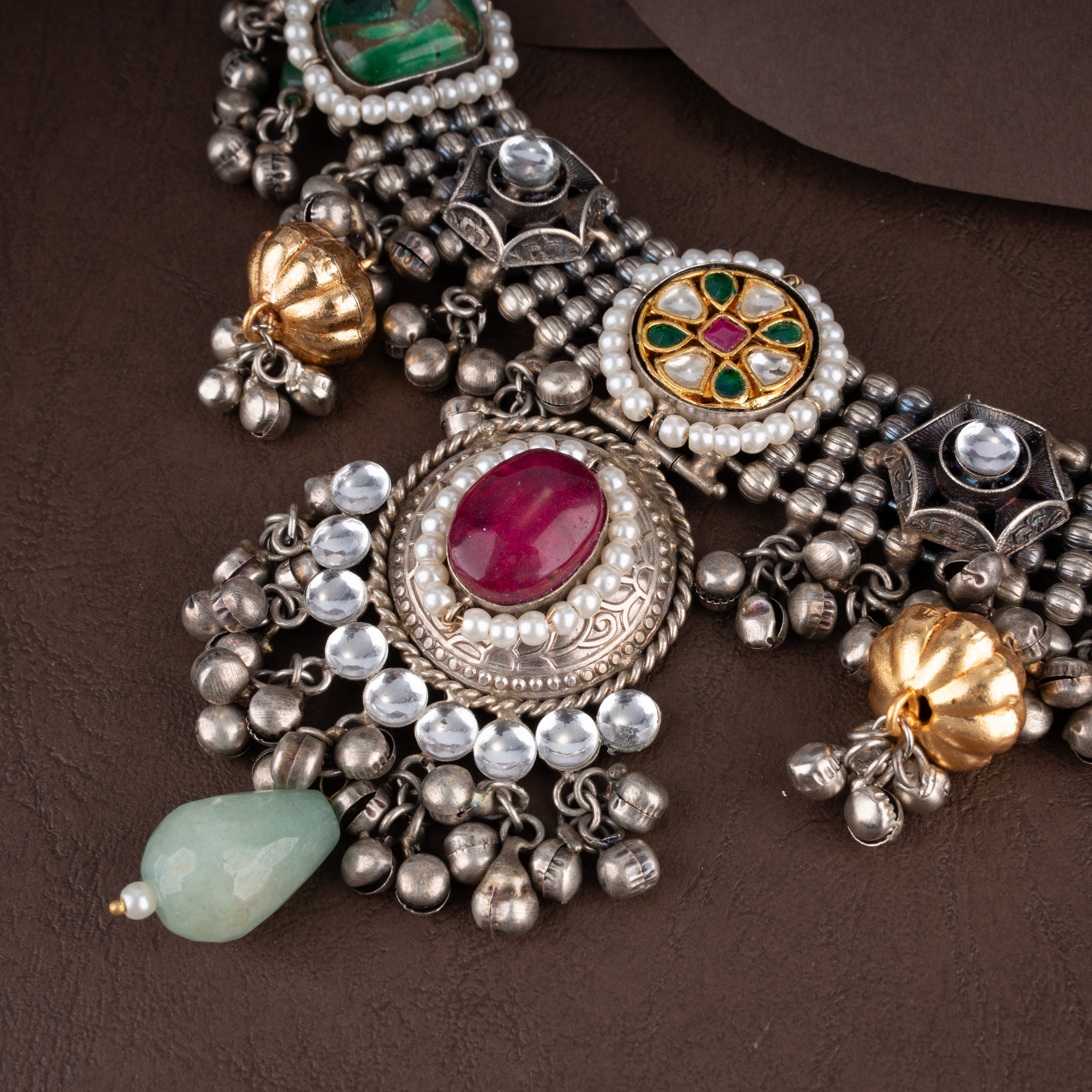 Oxidised Kundan Navratna-Inspired Choker Necklace Set with Cabochon Stones, Ghungroos, and Drop Earrings