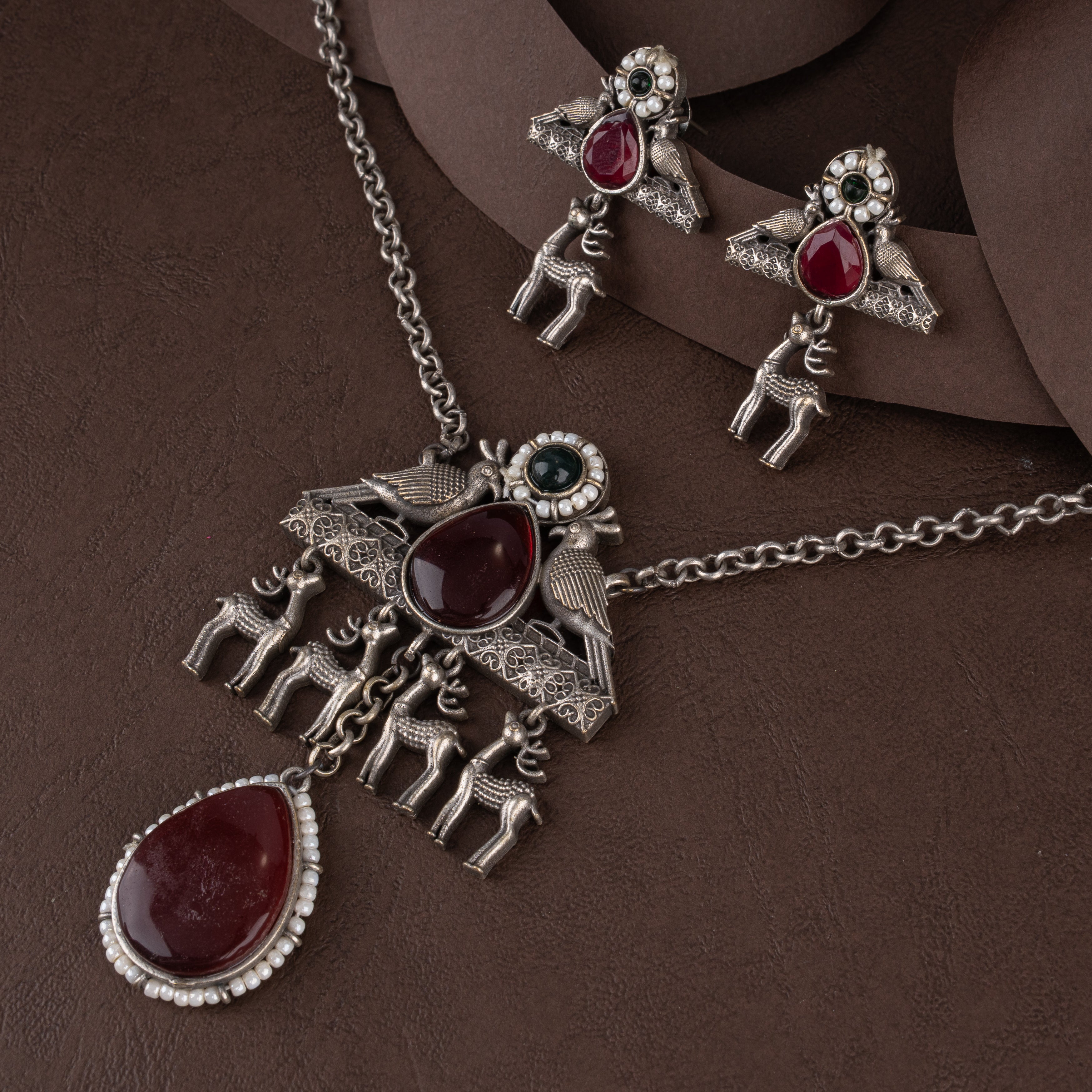 Oxidised Tribal Deer and Bird Medallion Pendant Necklace Set with Ruby Stones and Pearl Halos
