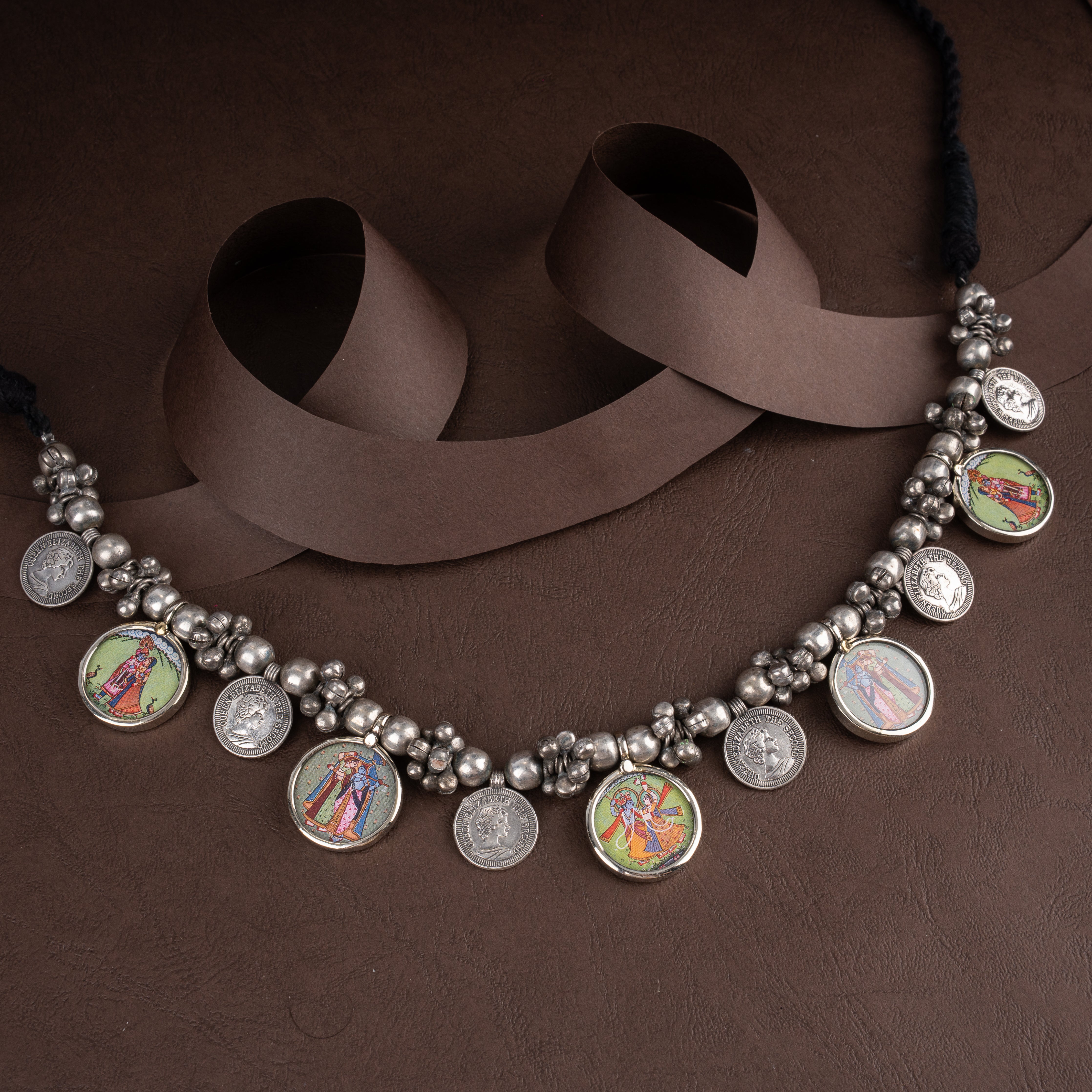Oxidised Tribal Beaded Coin Necklace with Miniature Pichwai Radha Krishna Medallions