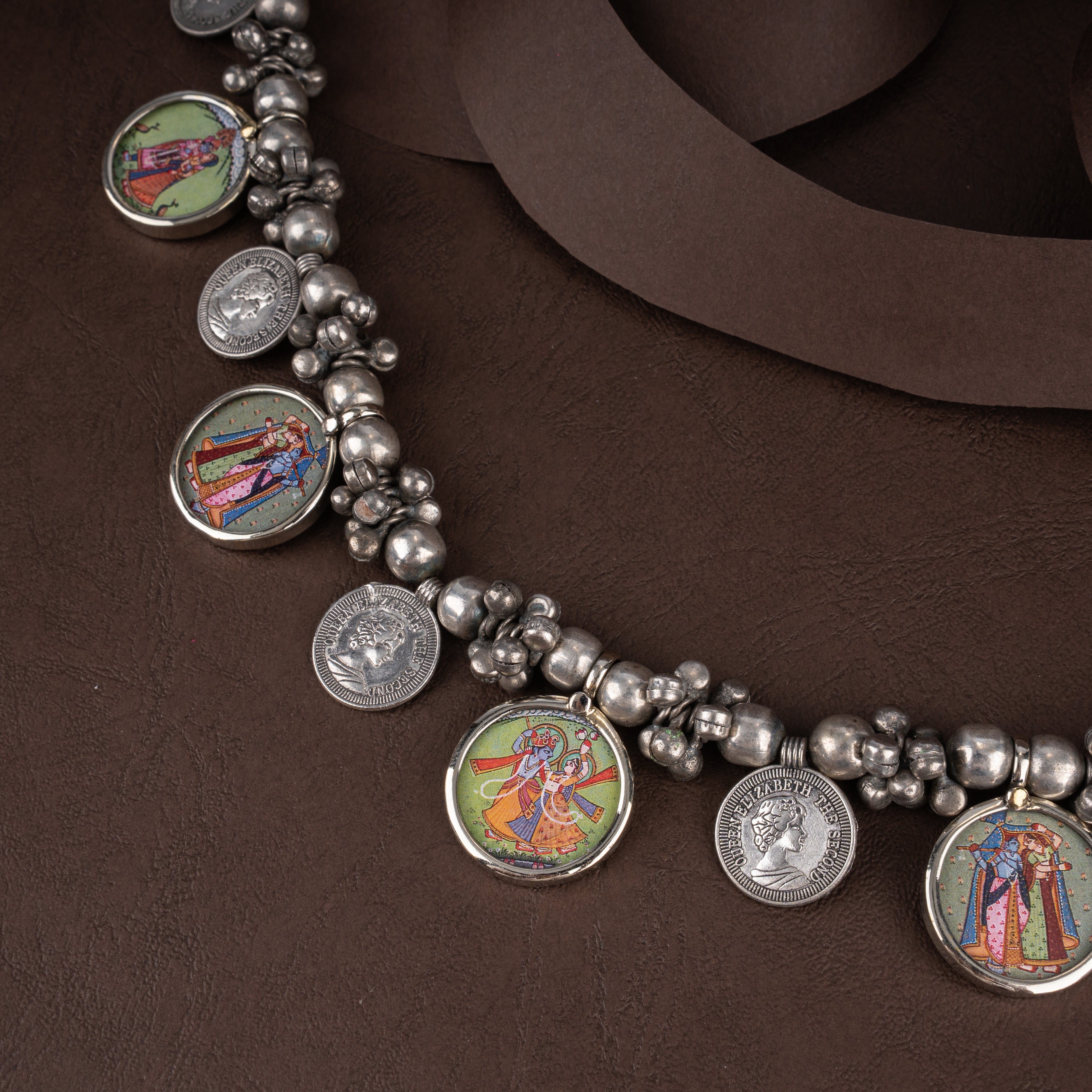 Oxidised Tribal Beaded Coin Necklace with Miniature Pichwai Radha Krishna Medallions