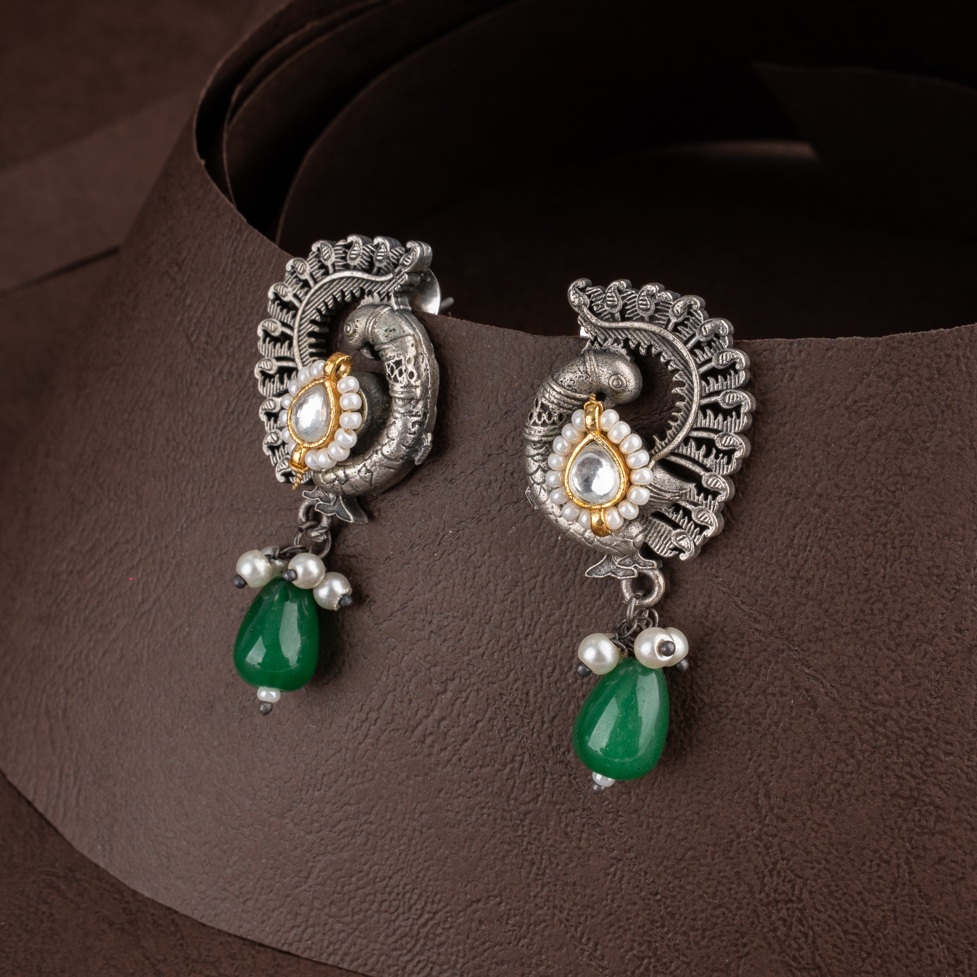 Dual-Tone Kundan Peacock Medallion Bib Necklace Set with Emerald Green Drops and Pearl Clusters