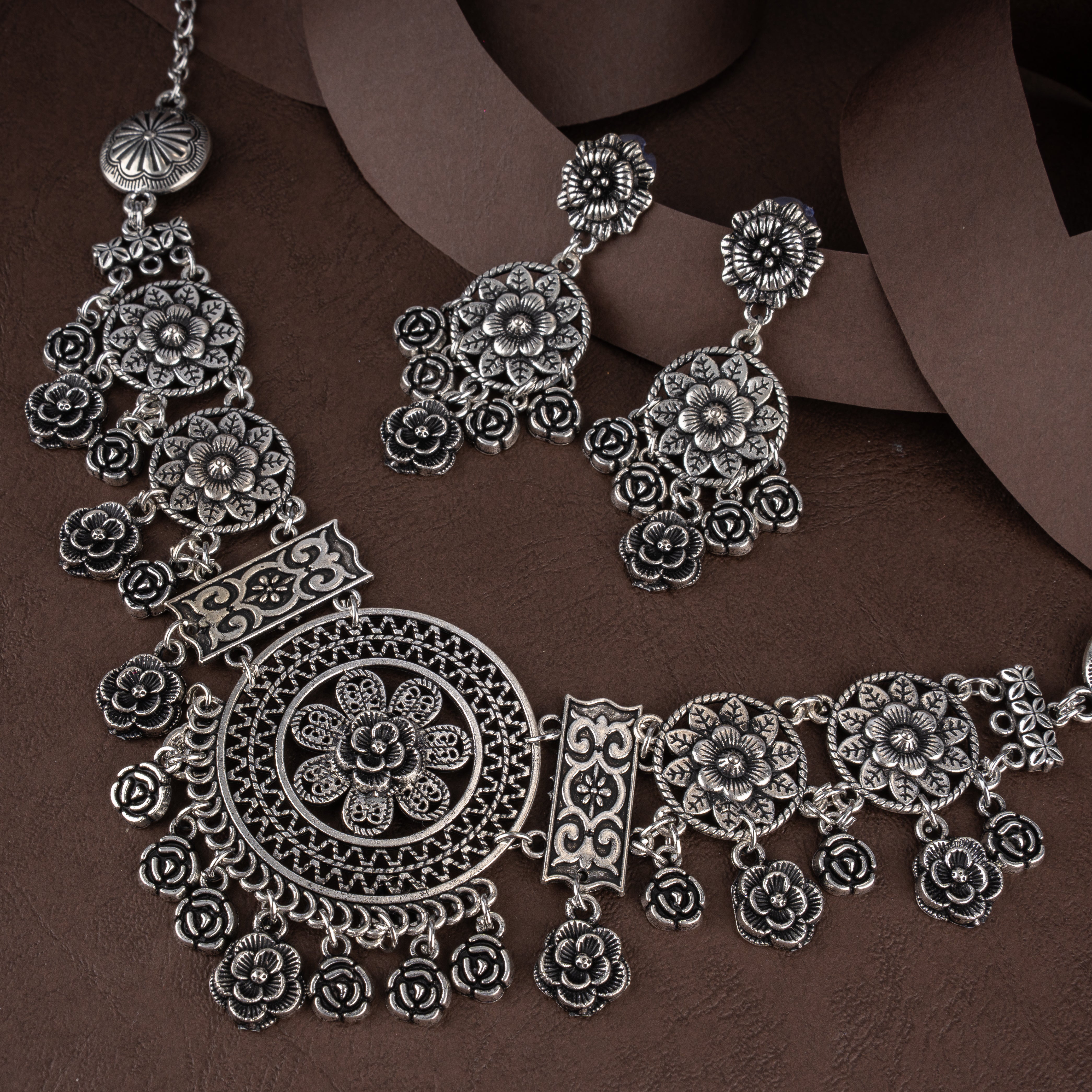 Oxidised Floral Mandala Medallion Asymmetrical Bib Necklace Set with Drop Earrings