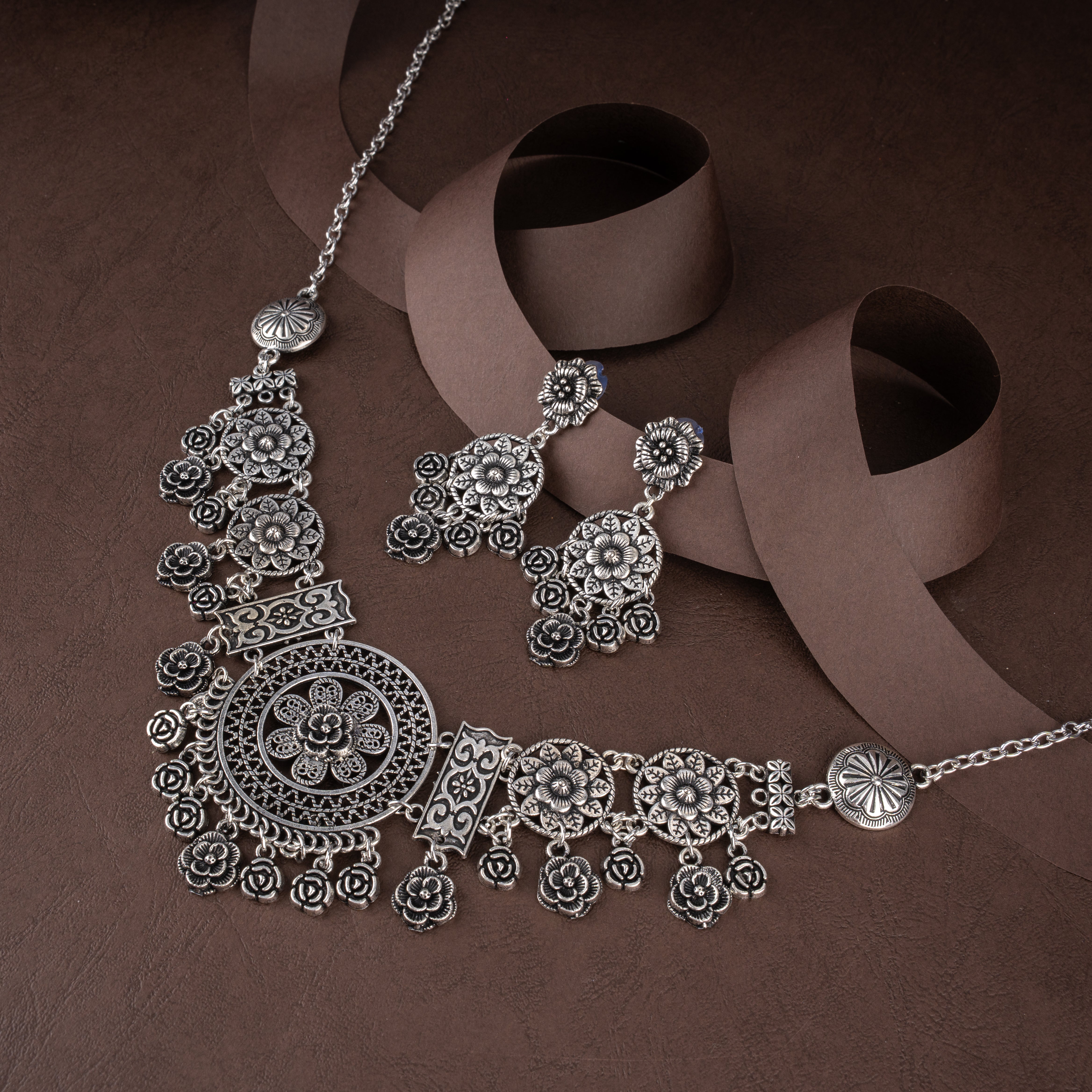 Oxidised Floral Mandala Medallion Asymmetrical Bib Necklace Set with Drop Earrings
