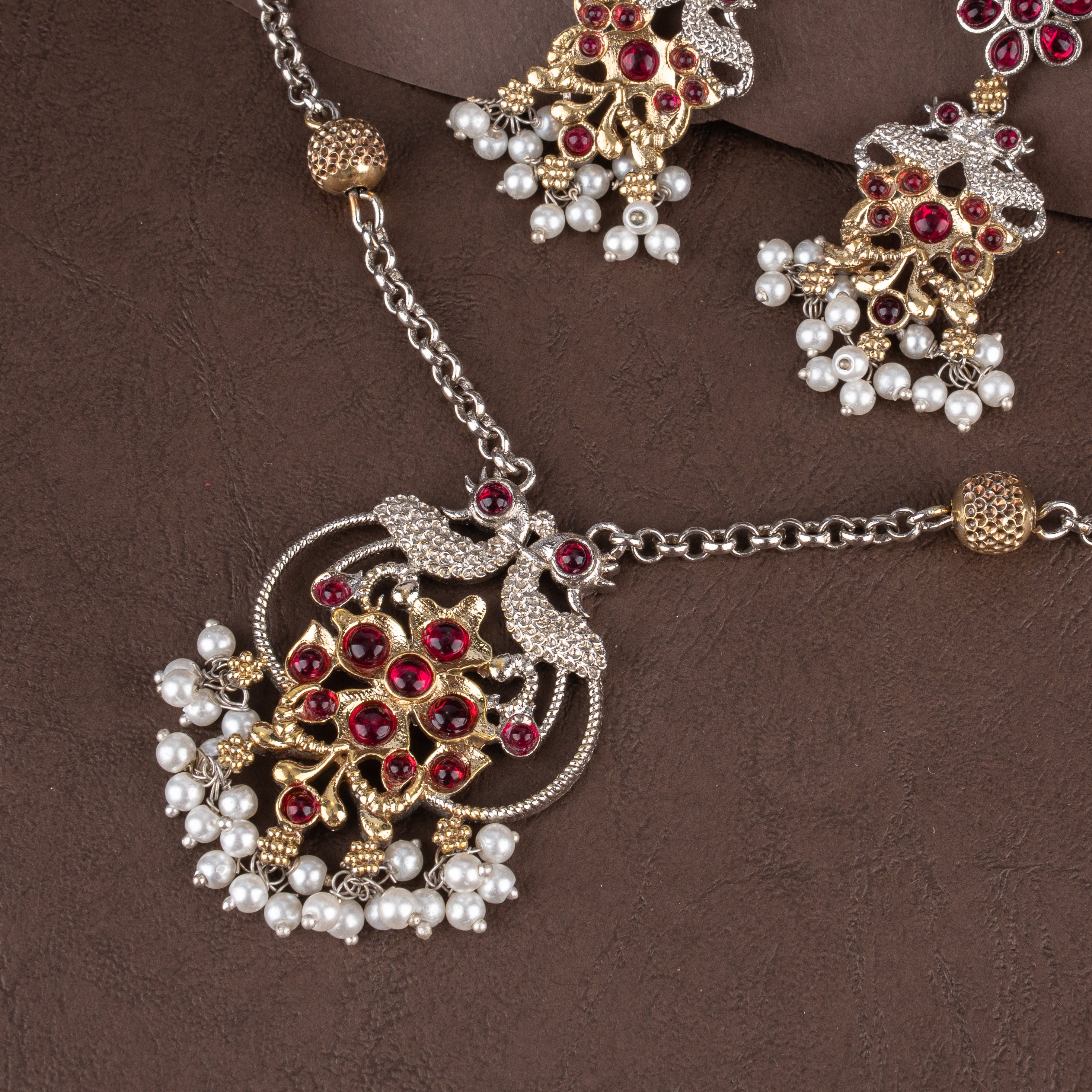 Dual-Tone Ruby-Pink Kundan Peacock Medallion Pendant Necklace Set with Seed Pearl Clusters and Drop Earrings