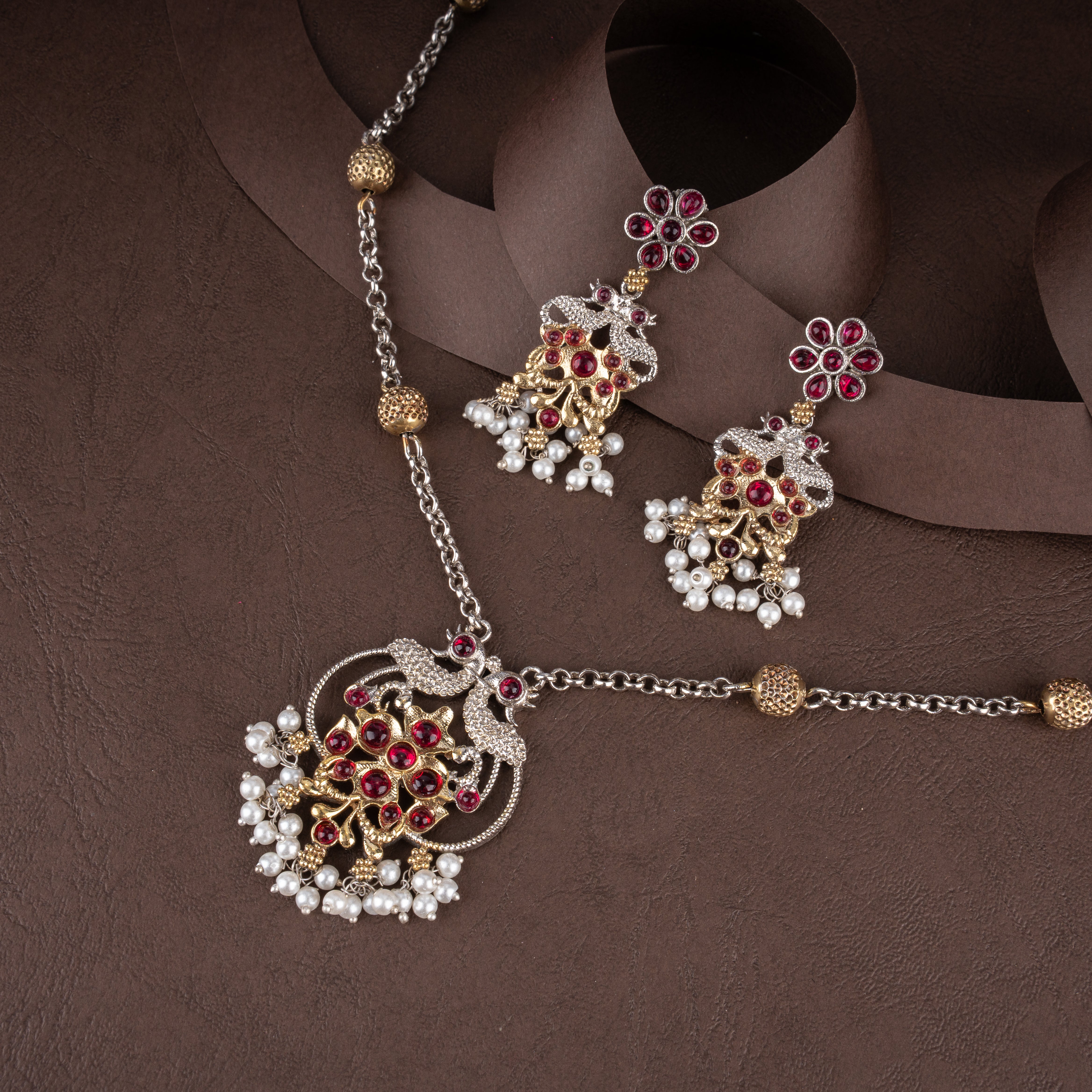 Dual-Tone Ruby-Pink Kundan Peacock Medallion Pendant Necklace Set with Seed Pearl Clusters and Drop Earrings