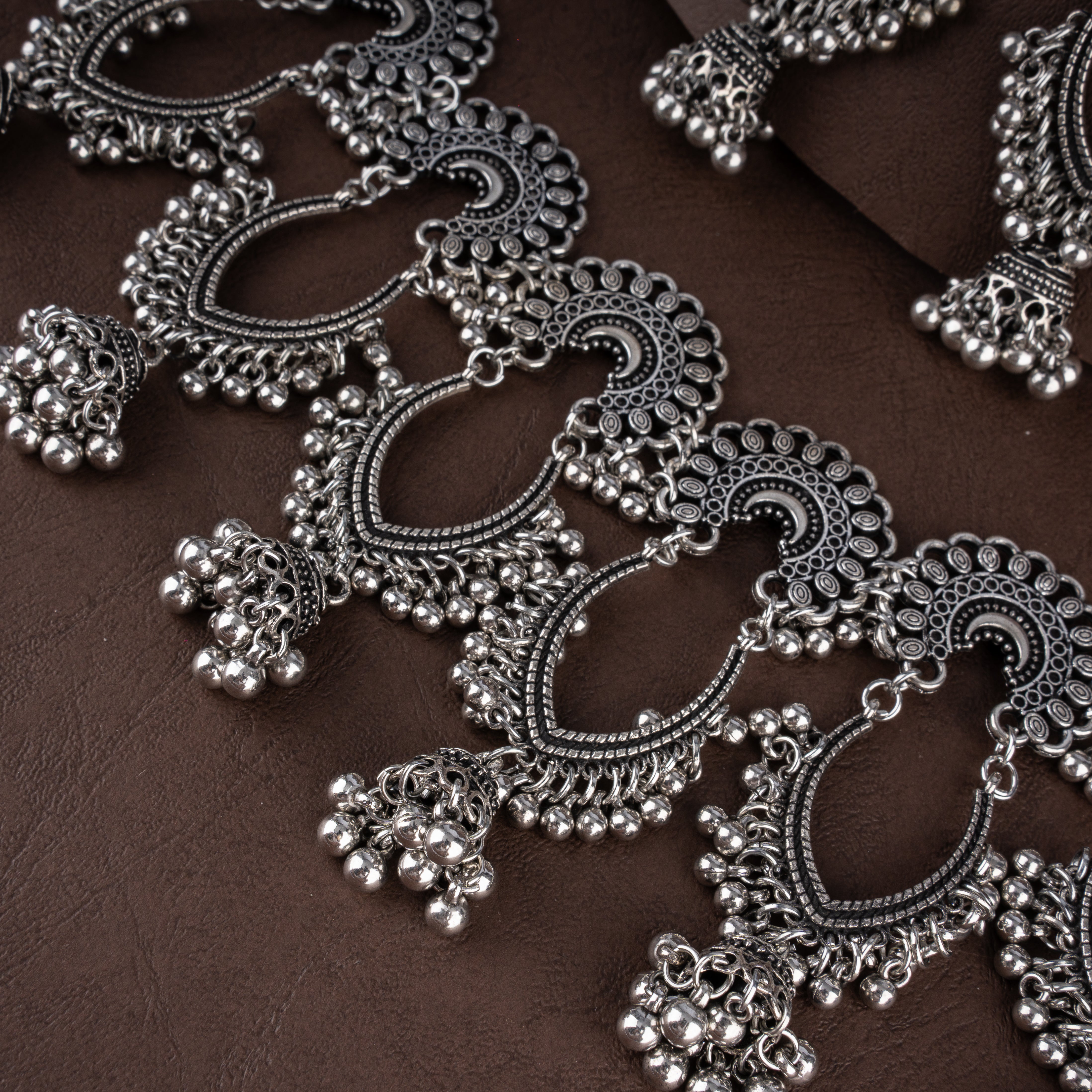Oxidised Openwork Teardrop Scallop Bib Necklace Set with Dome Jhumkis and Ghungroo Fringe