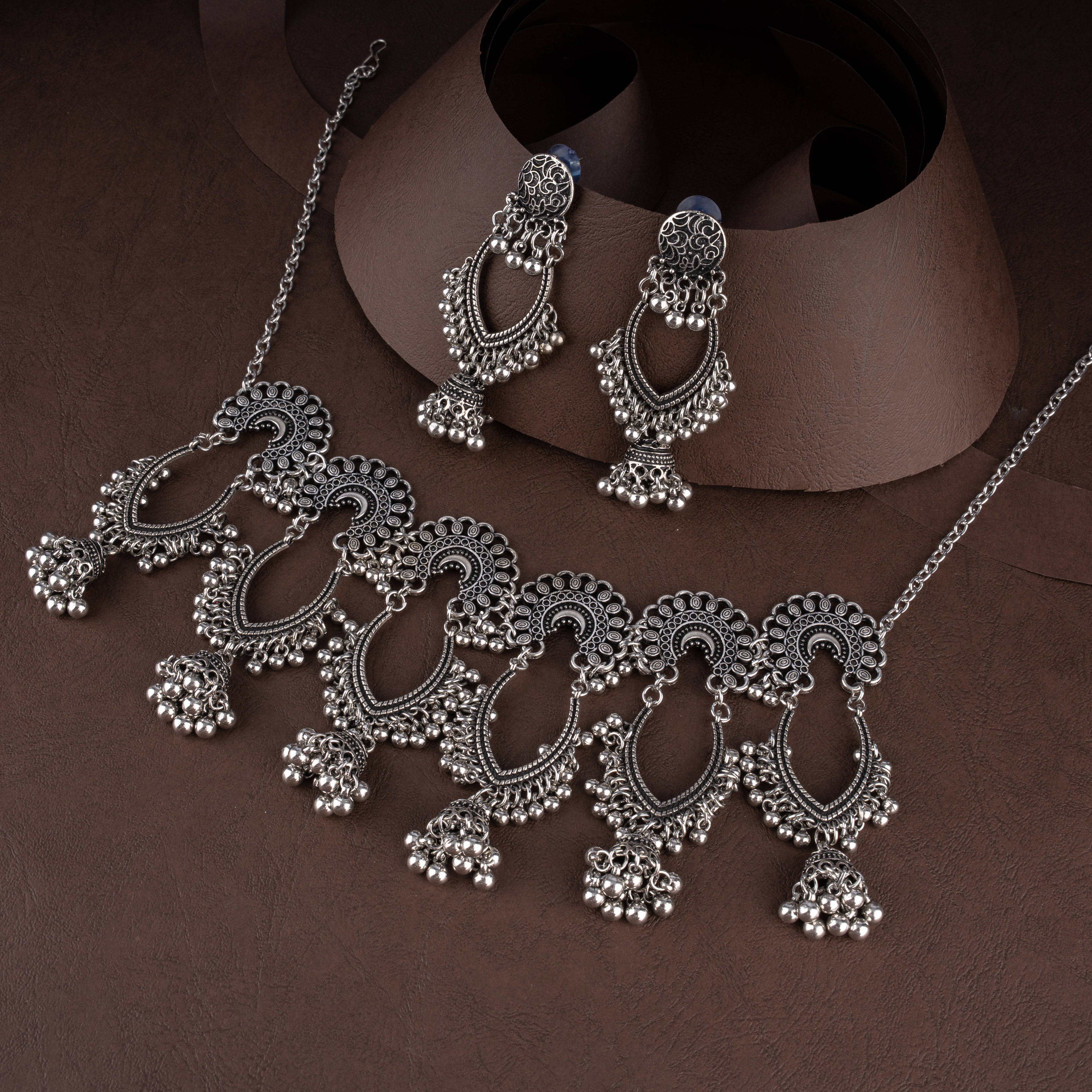 Oxidised Openwork Teardrop Scallop Bib Necklace Set with Dome Jhumkis and Ghungroo Fringe